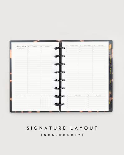 Open planner showing a monthly layout with a white background